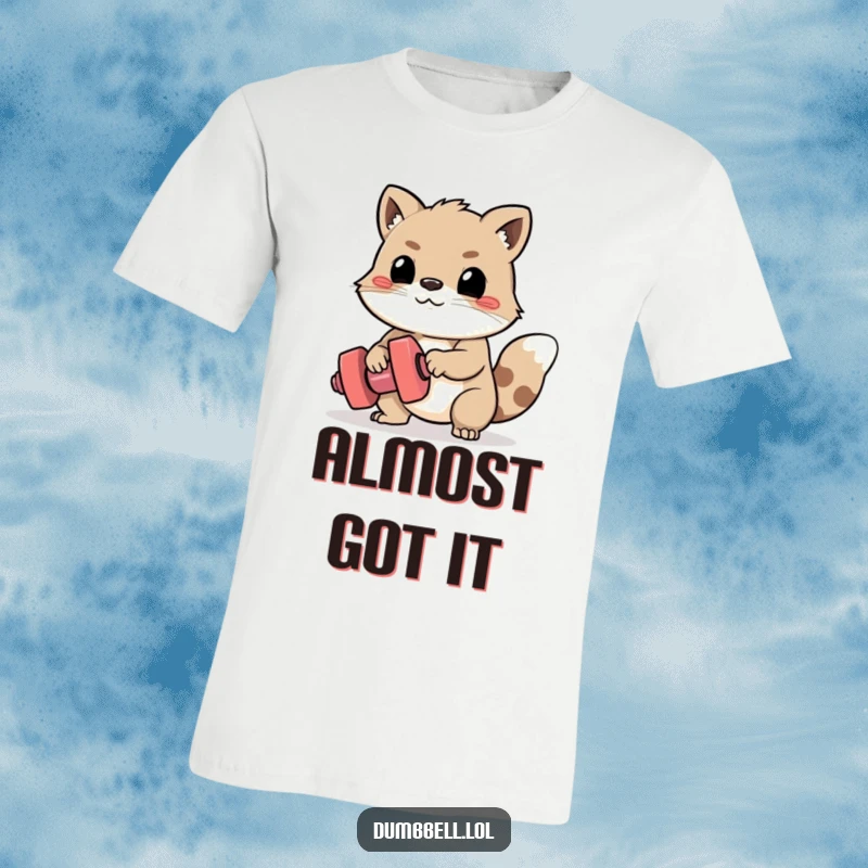 Funny T-Shirt: Animal with determined expression, straining to lift a minuscule dumbbell, embodying workout struggle.